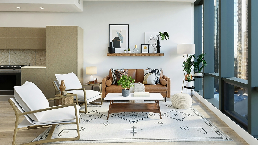 Modern living room with tan leather sofa, white armchairs, and Southwestern-pattern area rug.