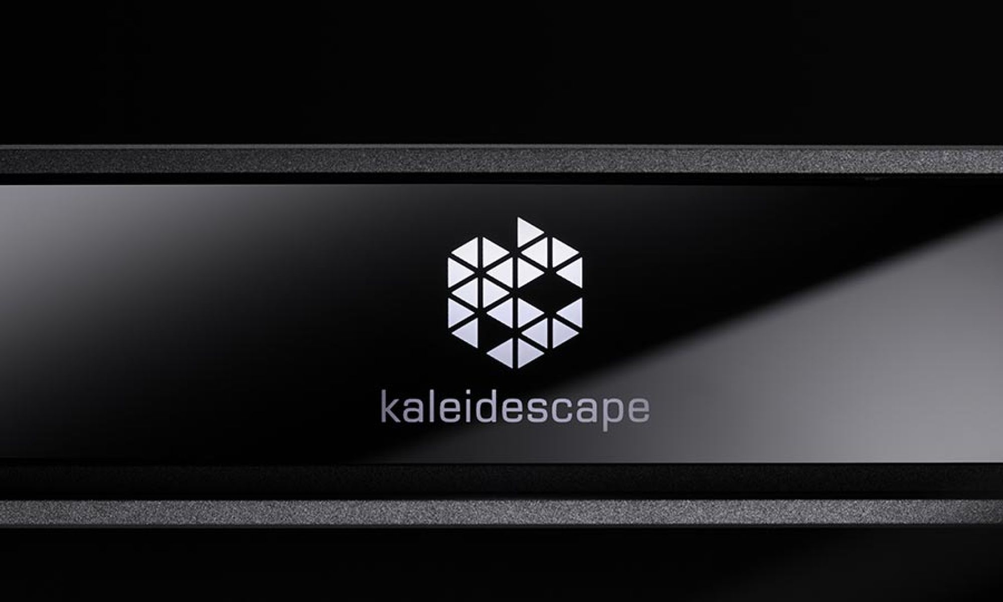 Electronic media player component displaying a glowing geometric logo